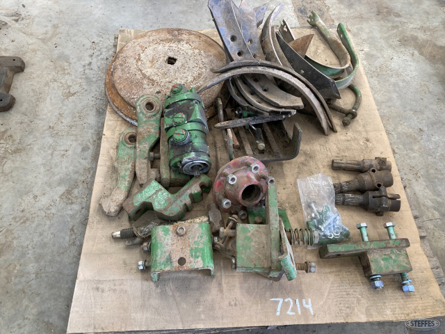 Pallet of John deere parts (3) PTO adapters, hammer straps, reversible twists, disk baldes and baler bands